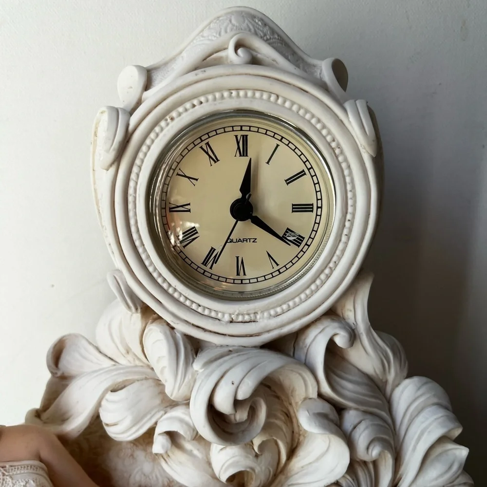 Elegant Cream Clock with Reclining Lady Figurine